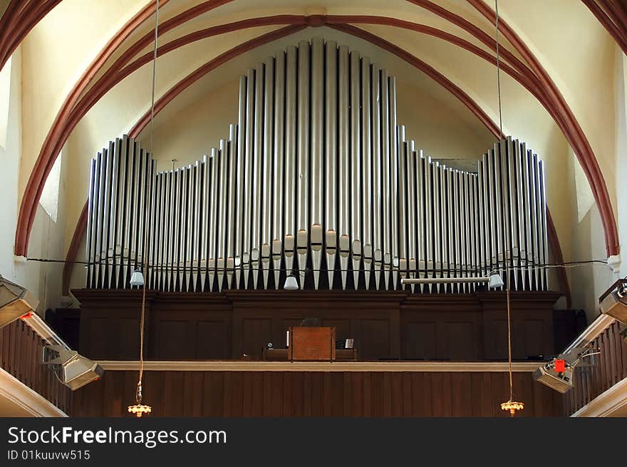 Old pipe organ inside of church