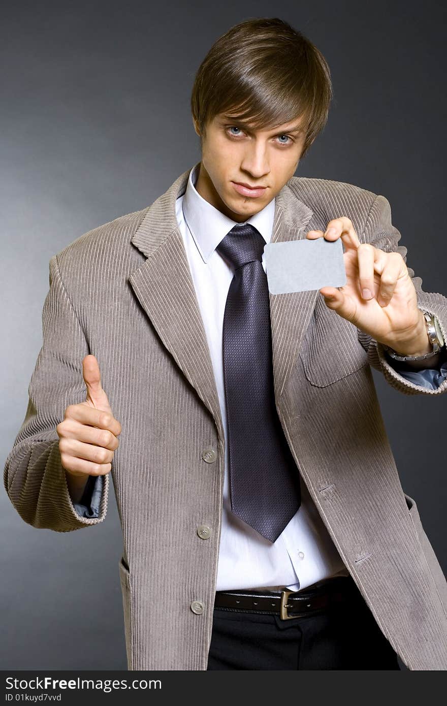 Business Man Showing A Blank Card