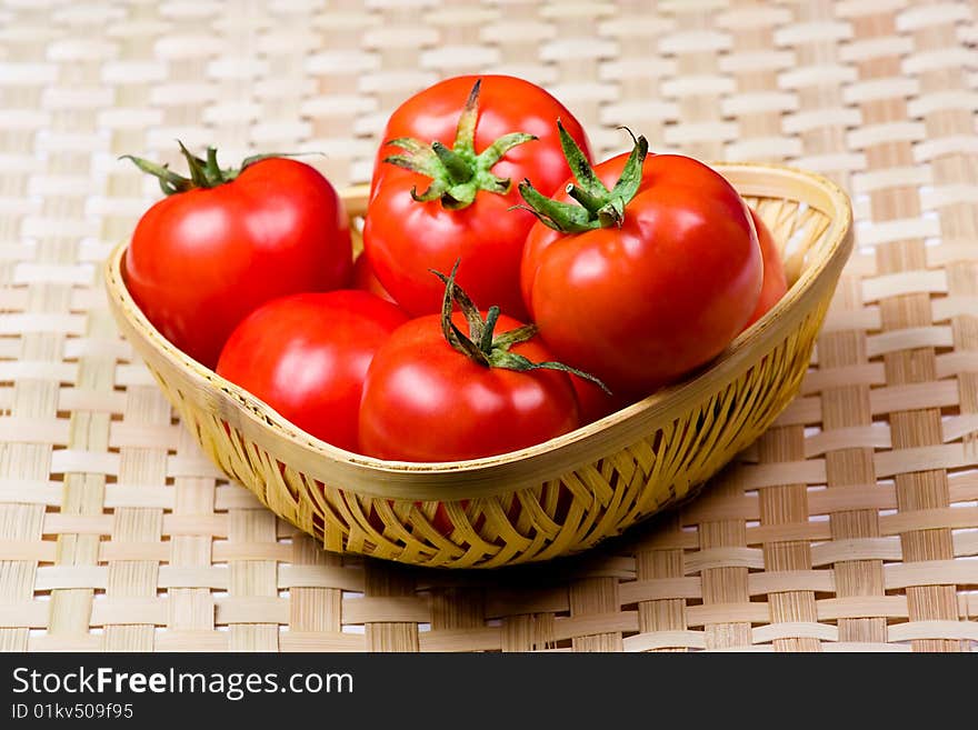 Tomato Basket With Bamboo Mat Background