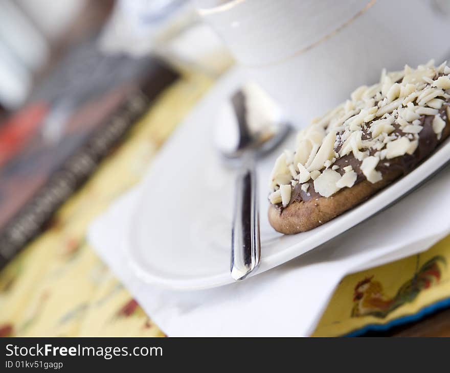 Cookie and coffee on a plate. Cookie and coffee on a plate