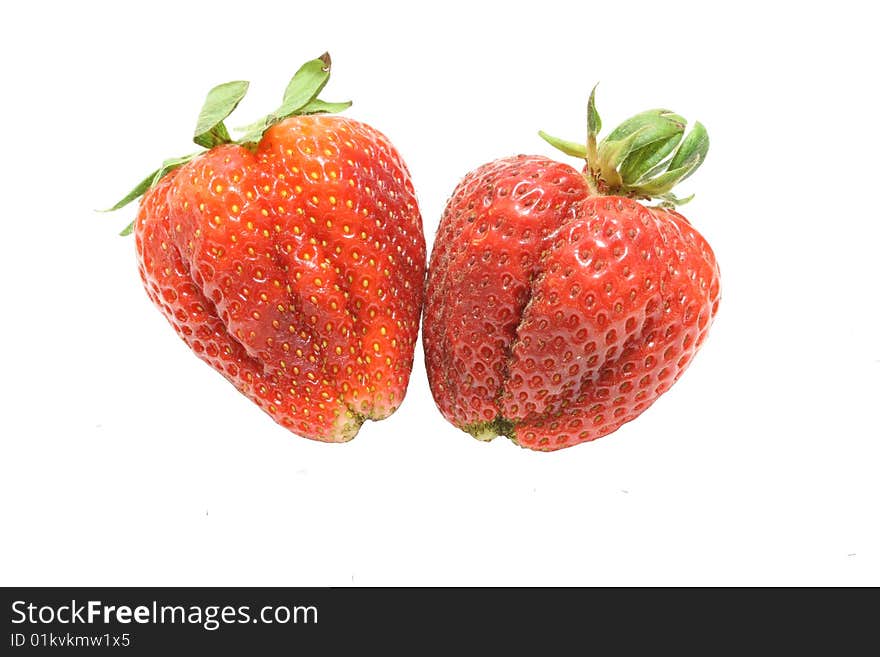 Two strawberries isolated over white