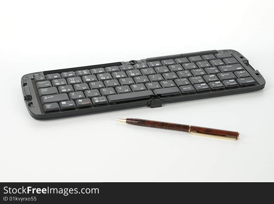 Compact Black Keyboard And Pen