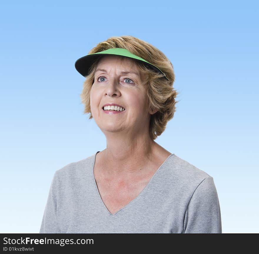 Mature Woman Gazing Into The Blue Sky