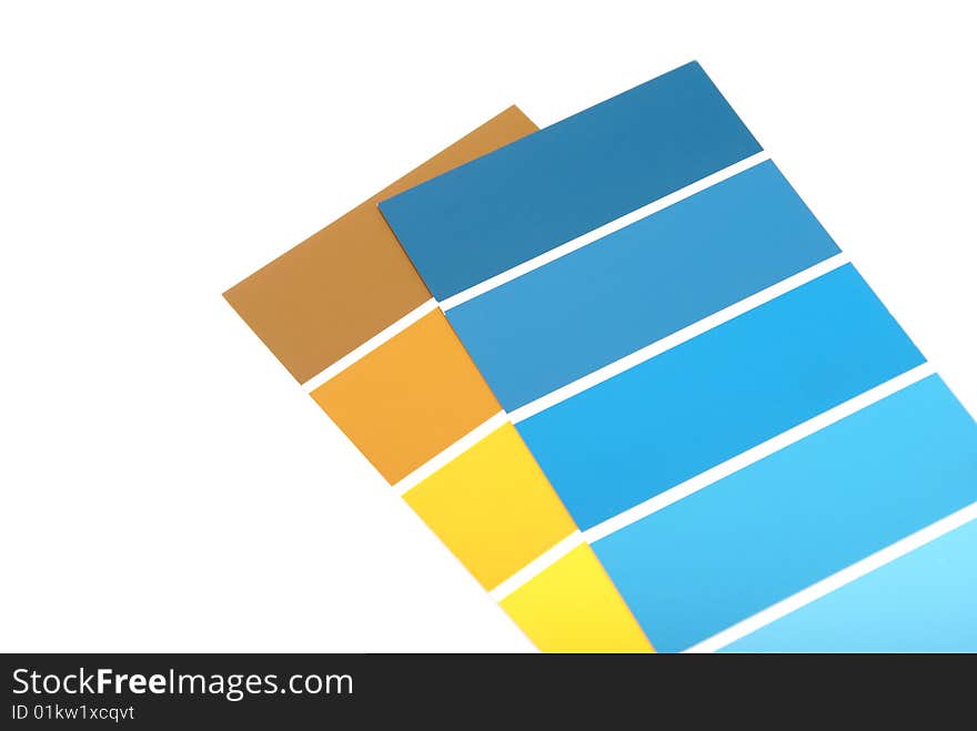 A yellow and blue paint sample on white background. A yellow and blue paint sample on white background.