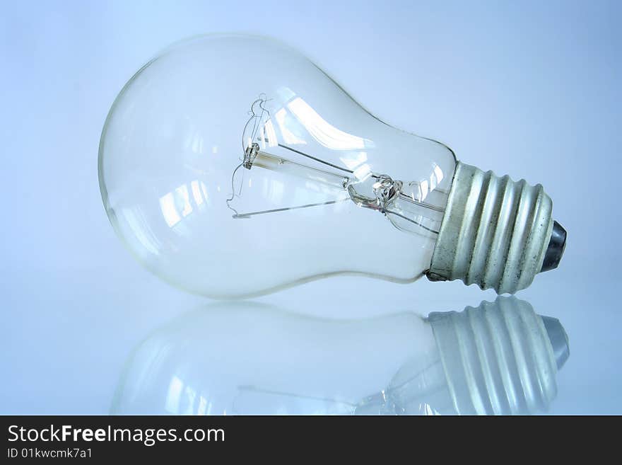 Light-bulb, blue tone,studio shot. Light-bulb, blue tone,studio shot