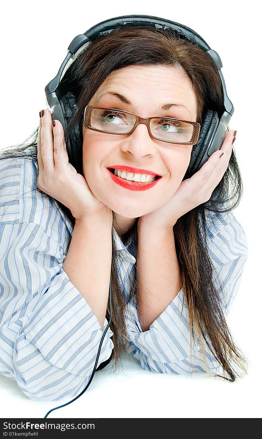 Smiling young woman with head phone on white. Smiling young woman with head phone on white