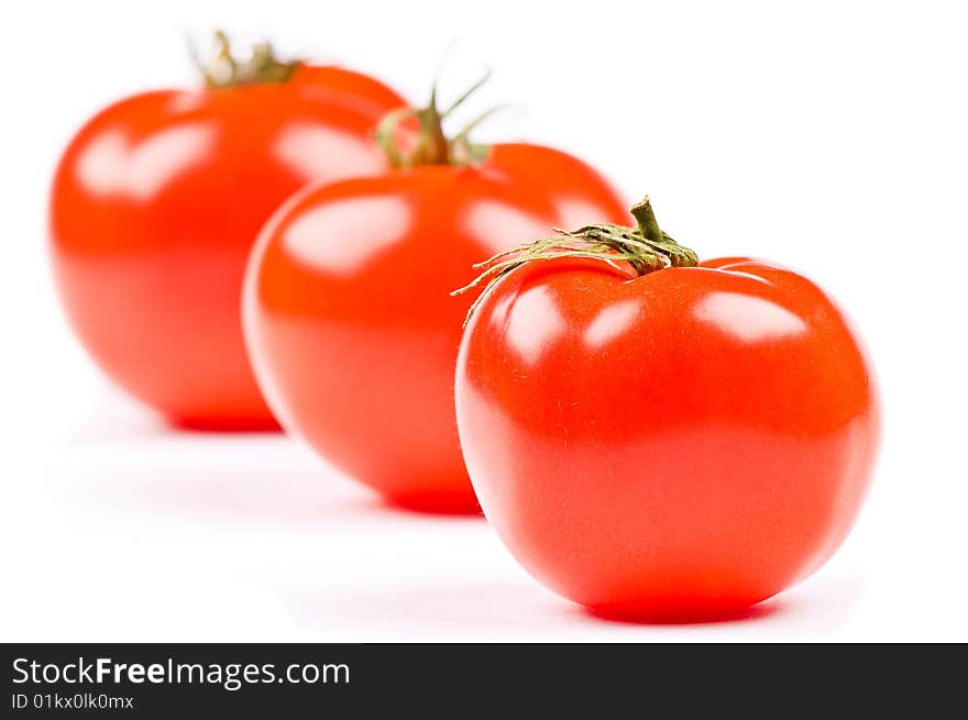 Tomatoes on the white background