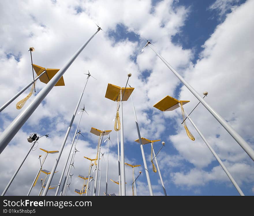 Wide angle view of wind and solar power generators. Wide angle view of wind and solar power generators