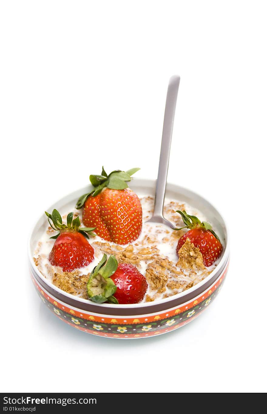 Bowl of cereal with milk and strawberrys. Bowl of cereal with milk and strawberrys