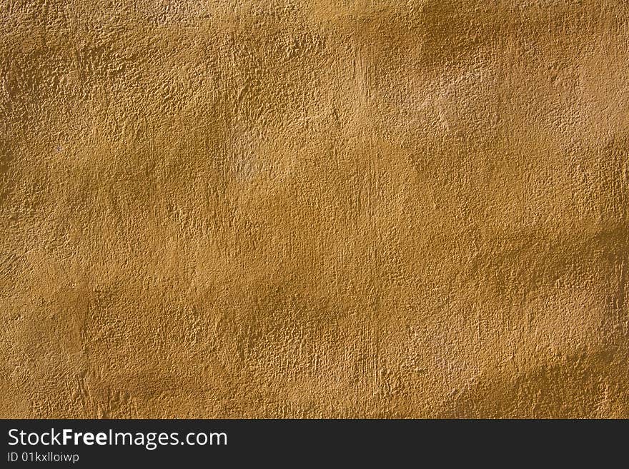 Yellow cement wall texture background. Yellow cement wall texture background