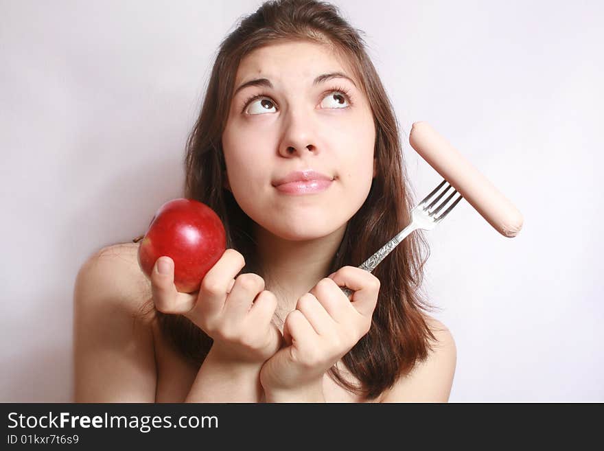 Portrait of the girl, choosing what to eat. Portrait of the girl, choosing what to eat.