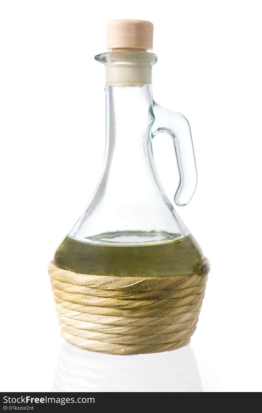 Jug of oil isolated on a white background