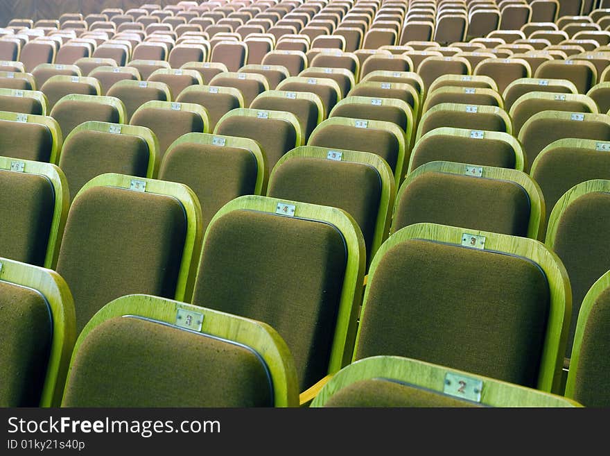 An empty old fashioned movie theater or conference hall. An empty old fashioned movie theater or conference hall.