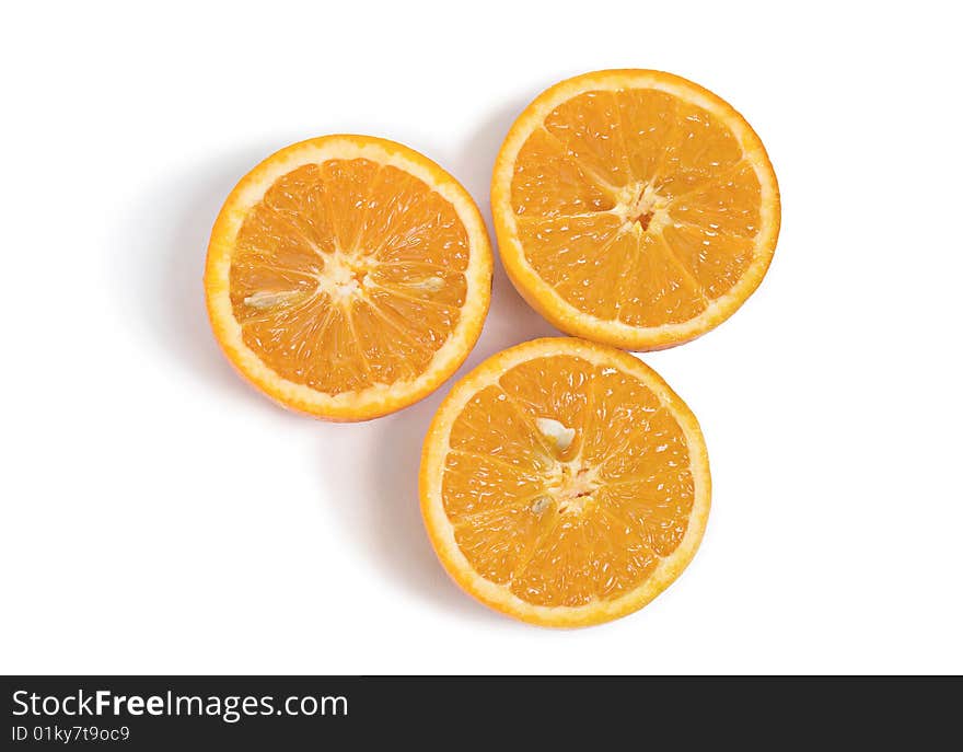 Three slices of orange isolated on white