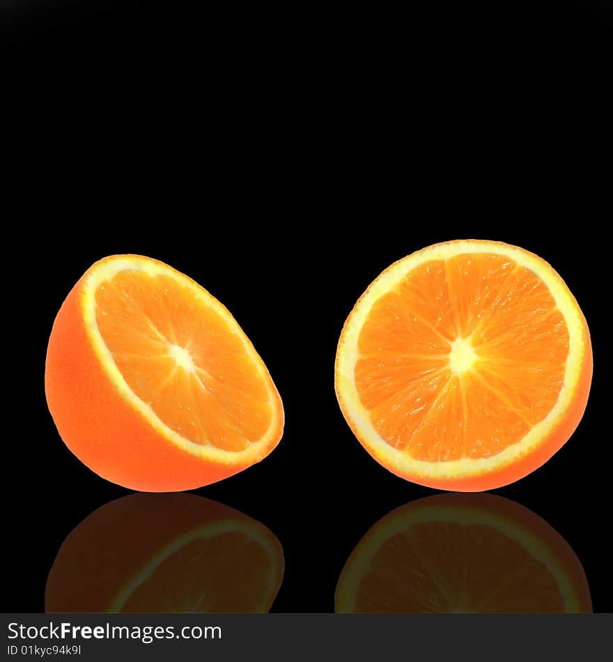 Orange fruit in two halves with reflection over black background. Orange fruit in two halves with reflection over black background.