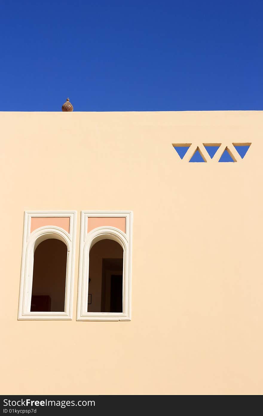 Wall of arabian house with windows