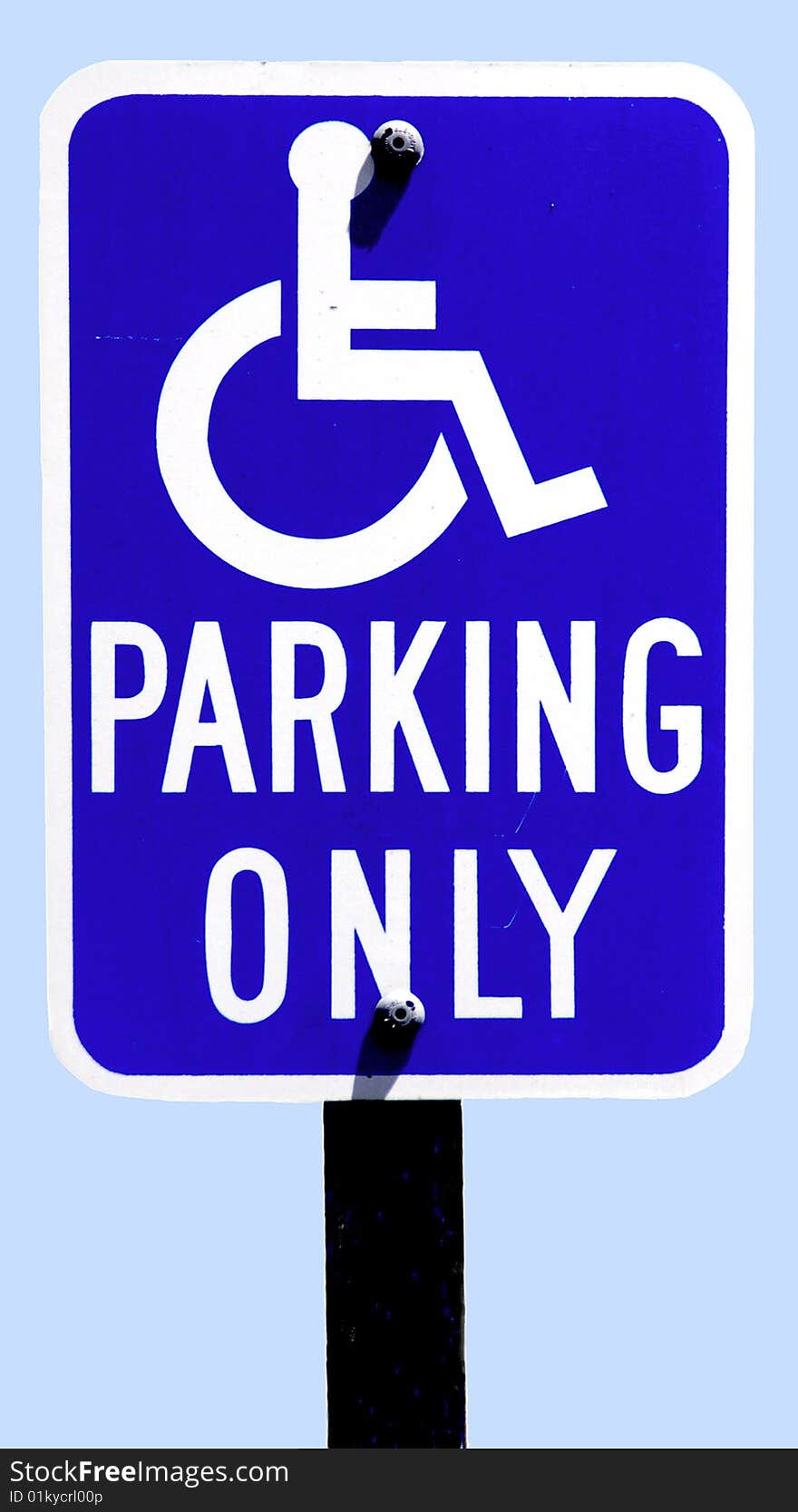 Actual parking sign for the disabled, against a clear blue sky. Actual parking sign for the disabled, against a clear blue sky.