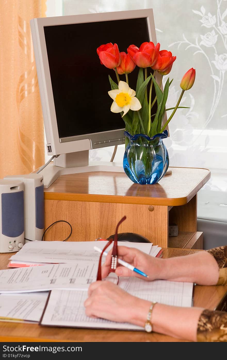 Bouquet on a workplace.