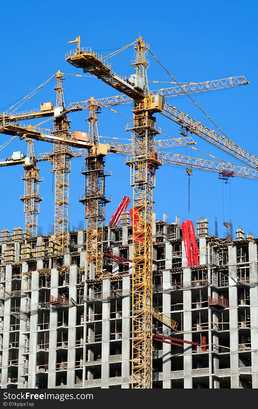 Photo of a building site of several many-storeyed buildings. Photo of a building site of several many-storeyed buildings.