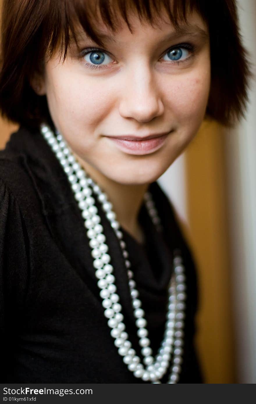 Beautiful girl with beads in her neck. Beautiful girl with beads in her neck