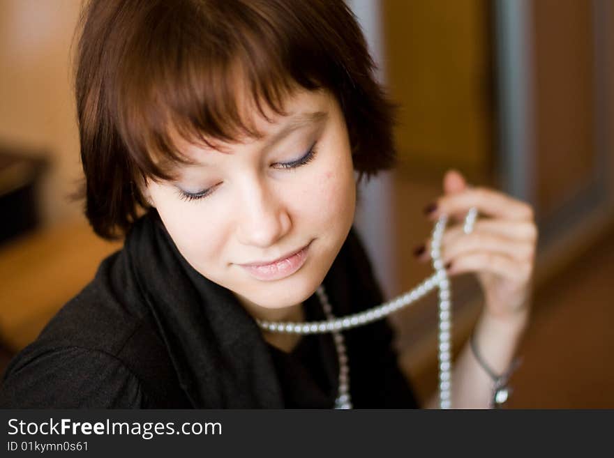 Girl with beads