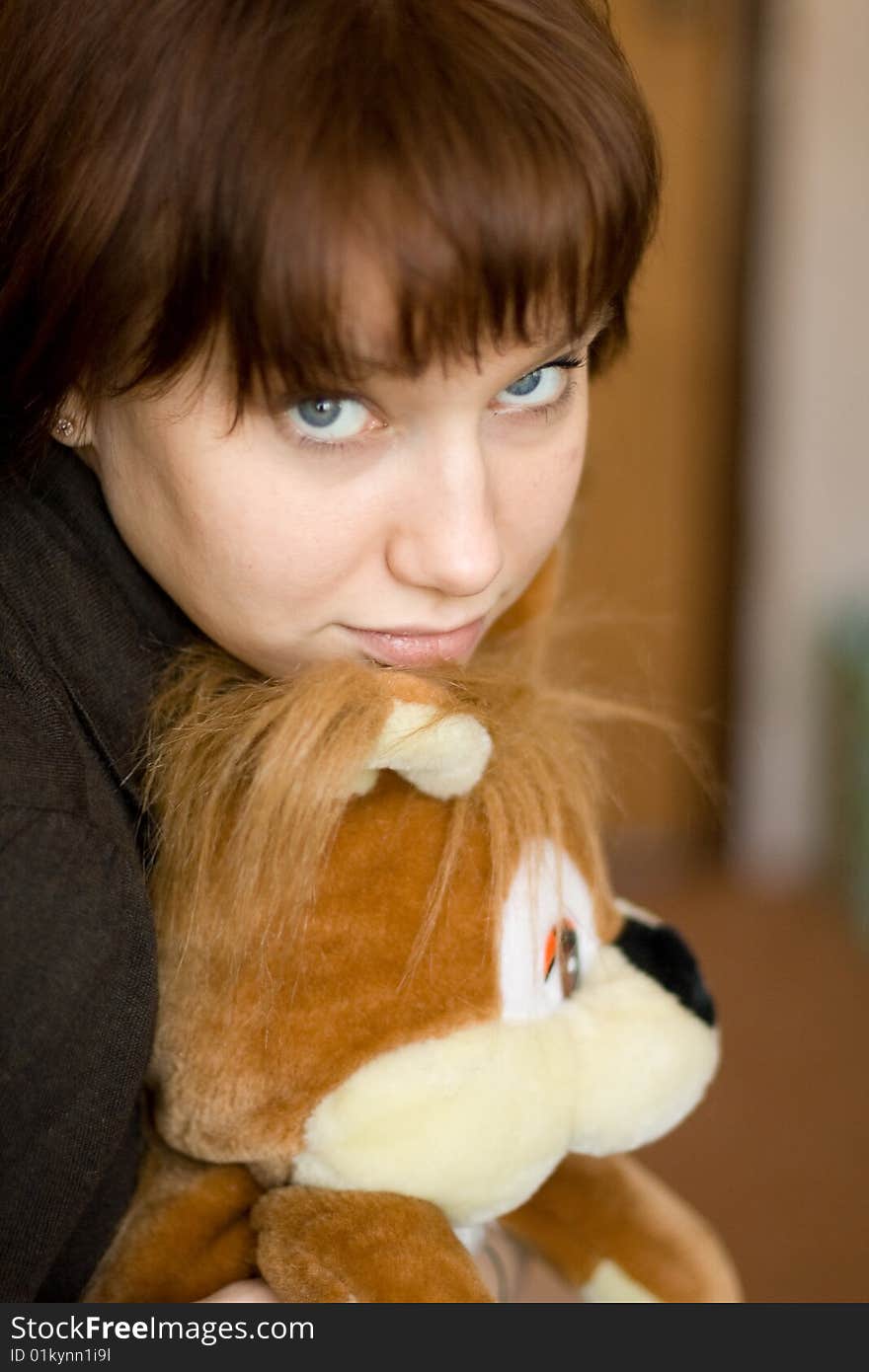 A girl holds a red squirrel. A girl holds a red squirrel