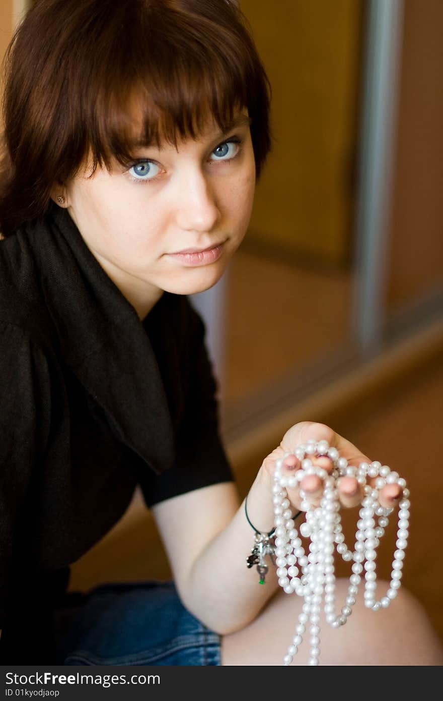 Girl with beads