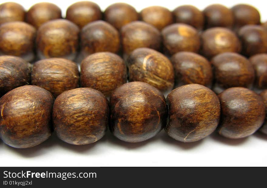 An abstract background of wooden balls in a line