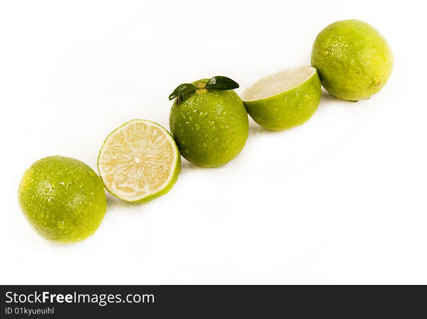 Fresh green lemons full of vitamins