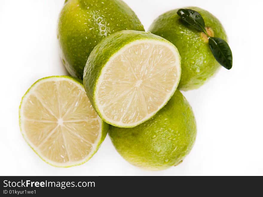 Fresh green lemons full of vitamins