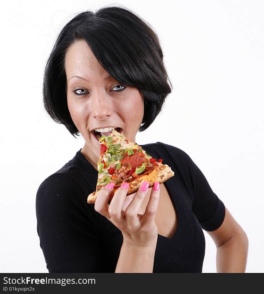 Sweet and pretty girl eating pizza slice