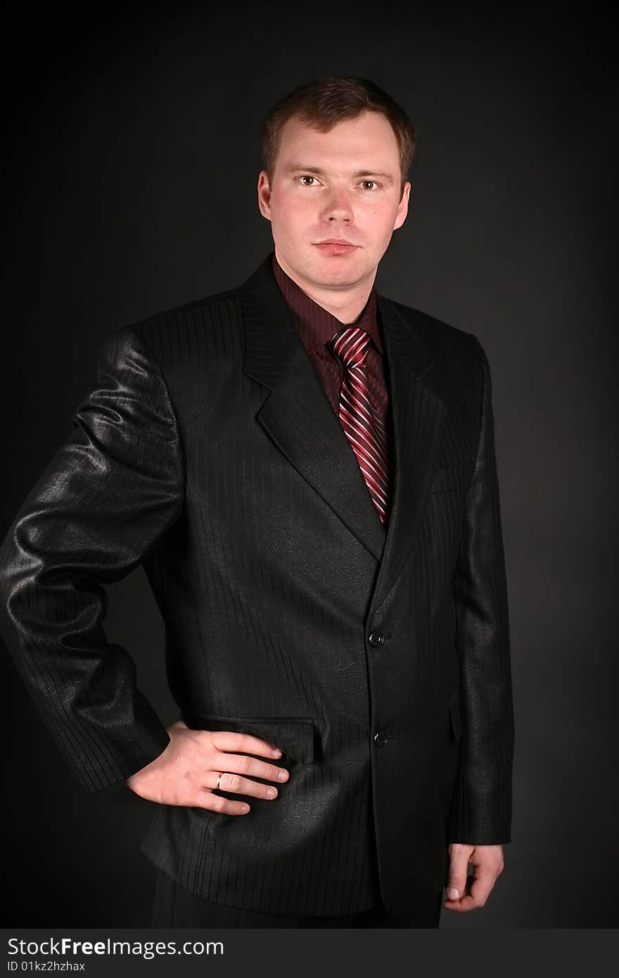 Young Man On A Black Background