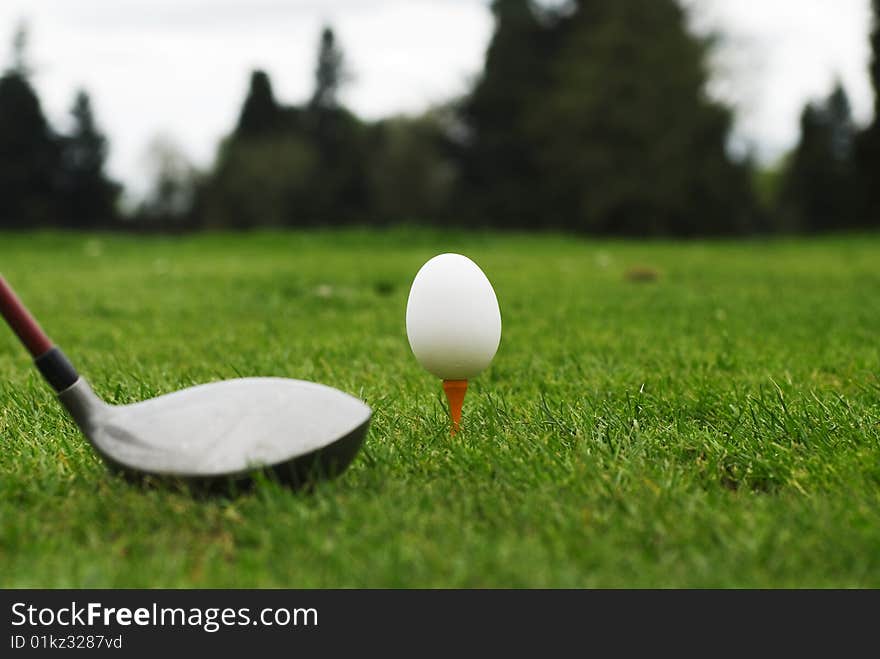 An egg instead of a golf ball making the game just a bit harder to play.  This is a metaphor for about everything in today's life and economy. An egg instead of a golf ball making the game just a bit harder to play.  This is a metaphor for about everything in today's life and economy.