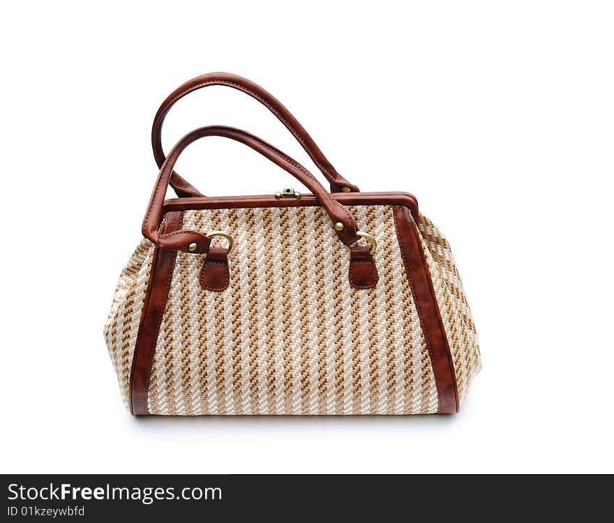 Shot of a fashionable bag on white. Shot of a fashionable bag on white