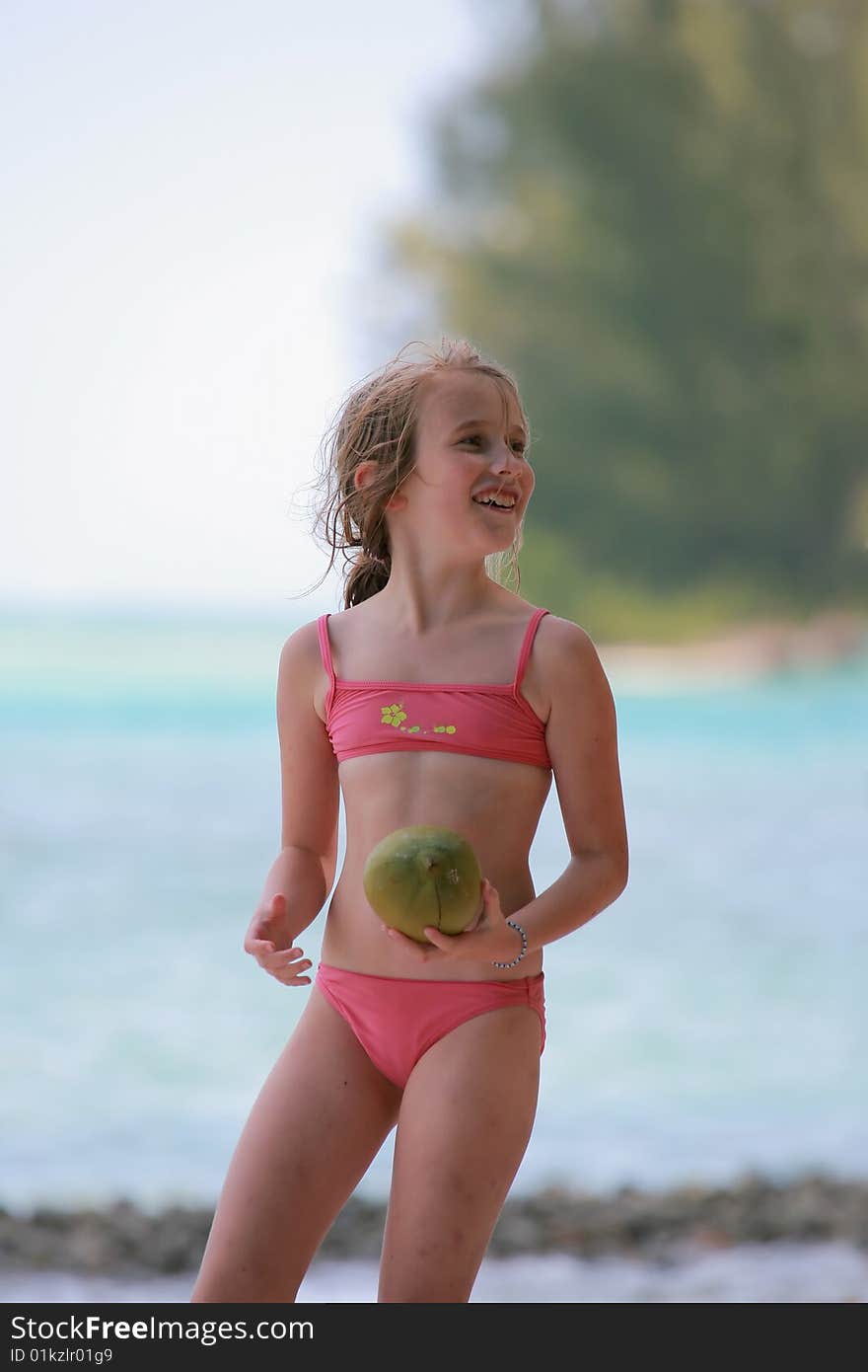 Girl holding coconut