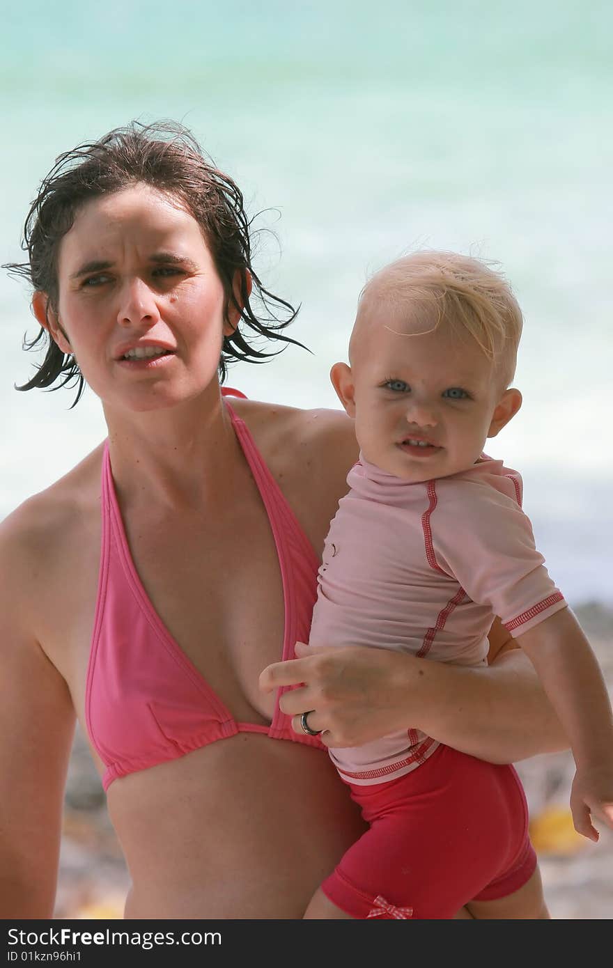 Mother and baby at beach