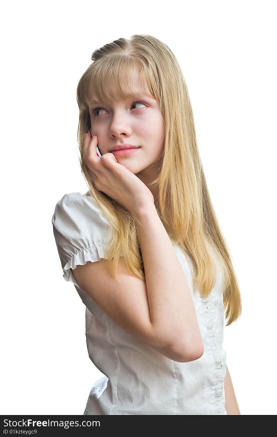 Young blonde girl talking to mobile phone. Young blonde girl talking to mobile phone