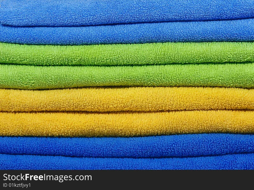 Bath towels in stack as background. Bath towels in stack as background