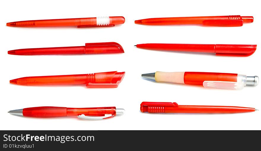 Collection of red pens on white ground