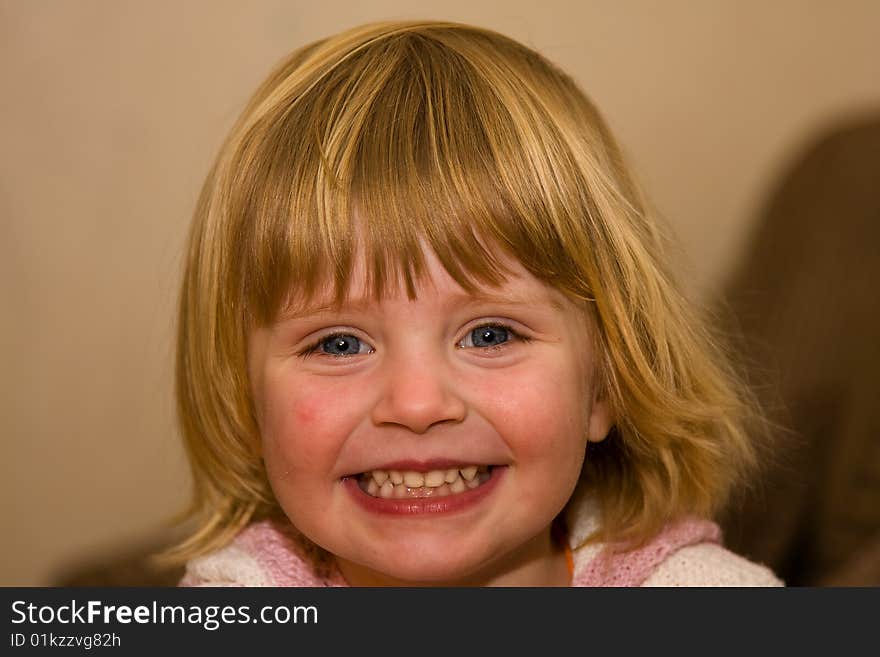 Close-up portrait of happy smiling baby