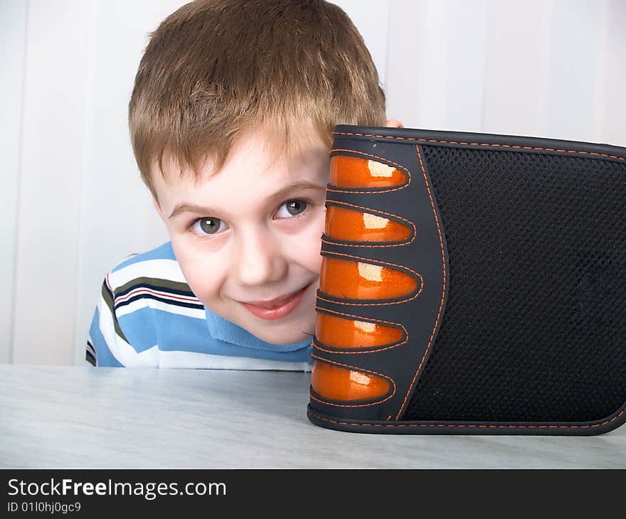 Portrait of the beautiful boy and cd box. Portrait of the beautiful boy and cd box