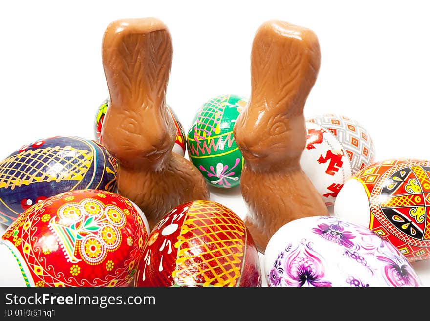 Chocolate easter rabbit in surroundings easter eggs