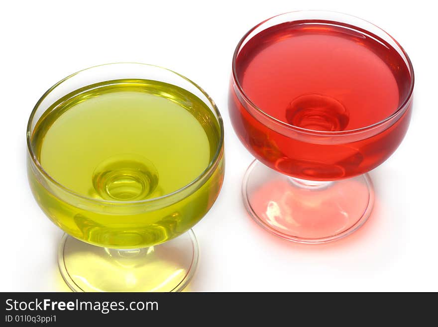 Red jelly in transparent glass, transparent, on white background. Red jelly in transparent glass, transparent, on white background