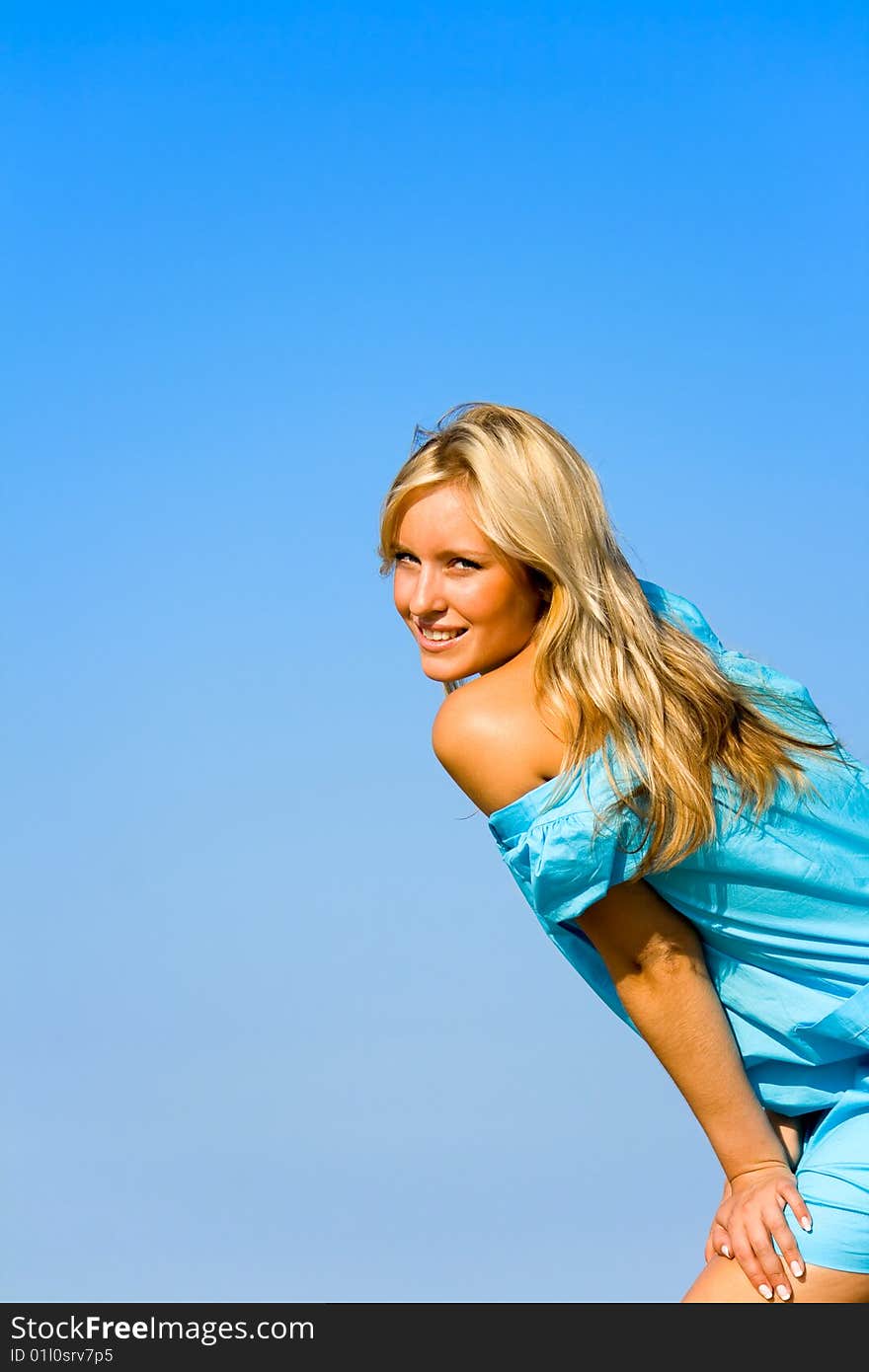 Gorgeous blond woman posing in a beach. Gorgeous blond woman posing in a beach