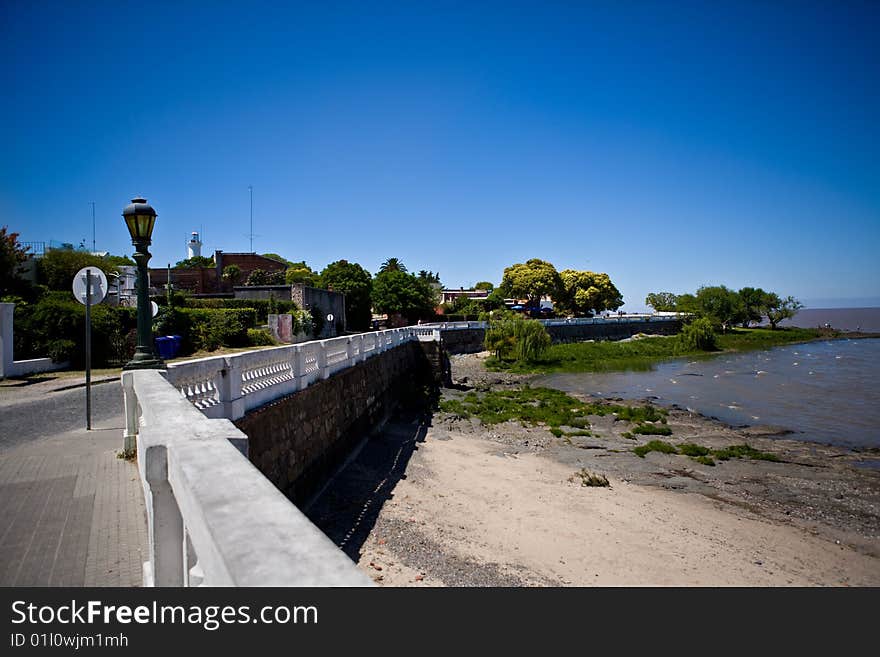 Colonia del Sacramento (formerly the Portuguese Colonia do Sacramento) is a city in southwestern Uruguay, by the Rio de la Plata, facing Buenos Aires, Argentina. It is the oldest town in Uruguay and capital of the departamento of Colonia. Colonia del Sacramento (formerly the Portuguese Colonia do Sacramento) is a city in southwestern Uruguay, by the Rio de la Plata, facing Buenos Aires, Argentina. It is the oldest town in Uruguay and capital of the departamento of Colonia.