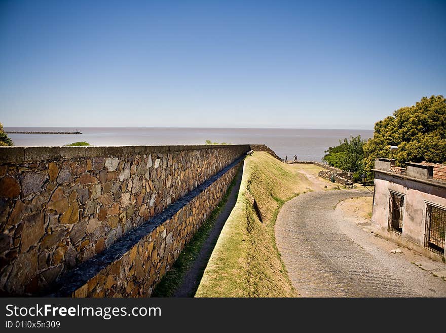 Colonia del Sacramento (formerly the Portuguese Colonia do Sacramento) is a city in southwestern Uruguay, by the Rio de la Plata, facing Buenos Aires, Argentina. It is the oldest town in Uruguay and capital of the departamento of Colonia. Colonia del Sacramento (formerly the Portuguese Colonia do Sacramento) is a city in southwestern Uruguay, by the Rio de la Plata, facing Buenos Aires, Argentina. It is the oldest town in Uruguay and capital of the departamento of Colonia.