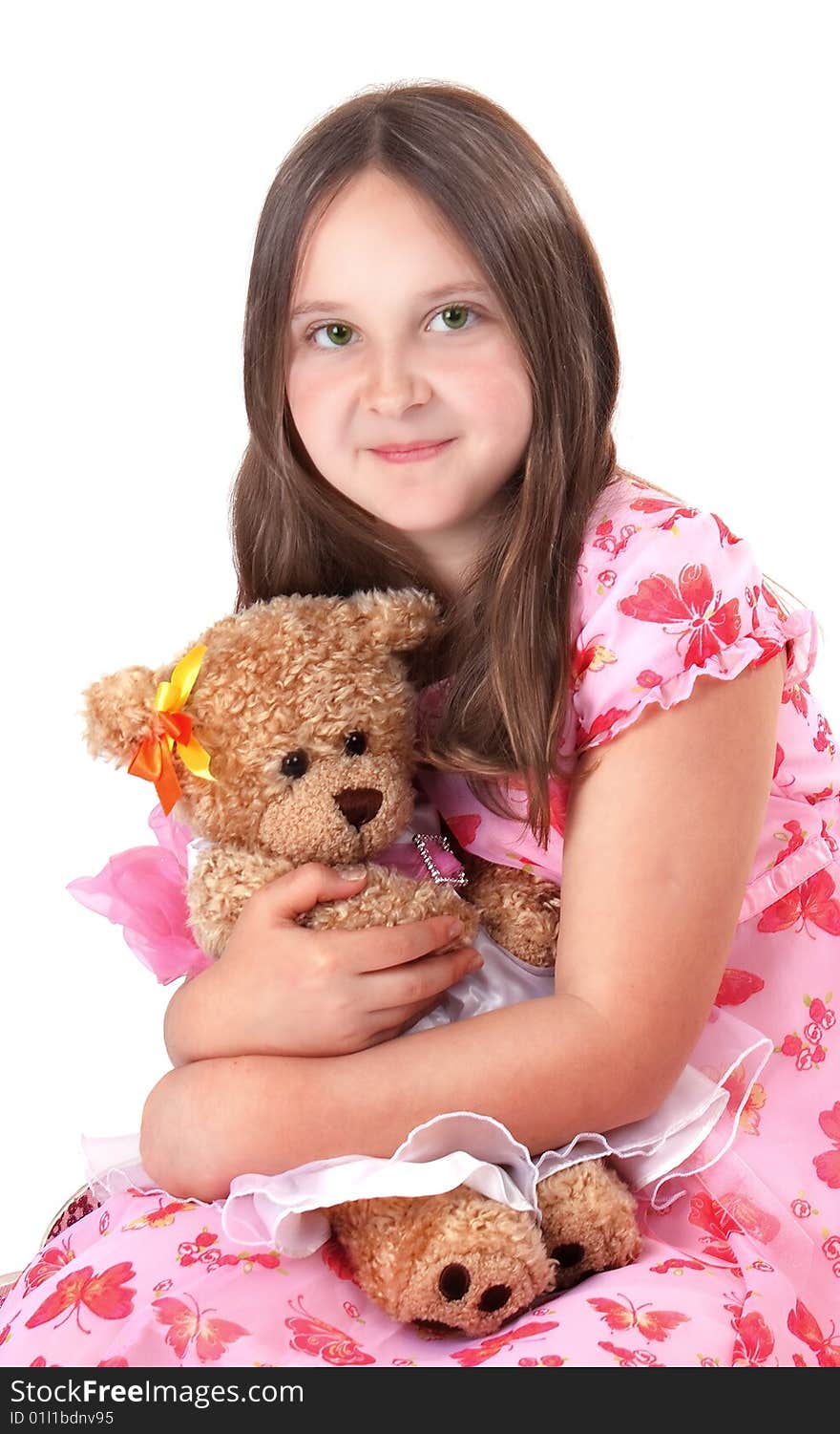 Girl in pink hat and dress with her teddy. Girl in pink hat and dress with her teddy