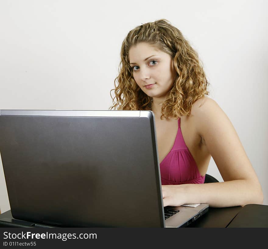 Office girl working on computer in office. Office girl working on computer in office