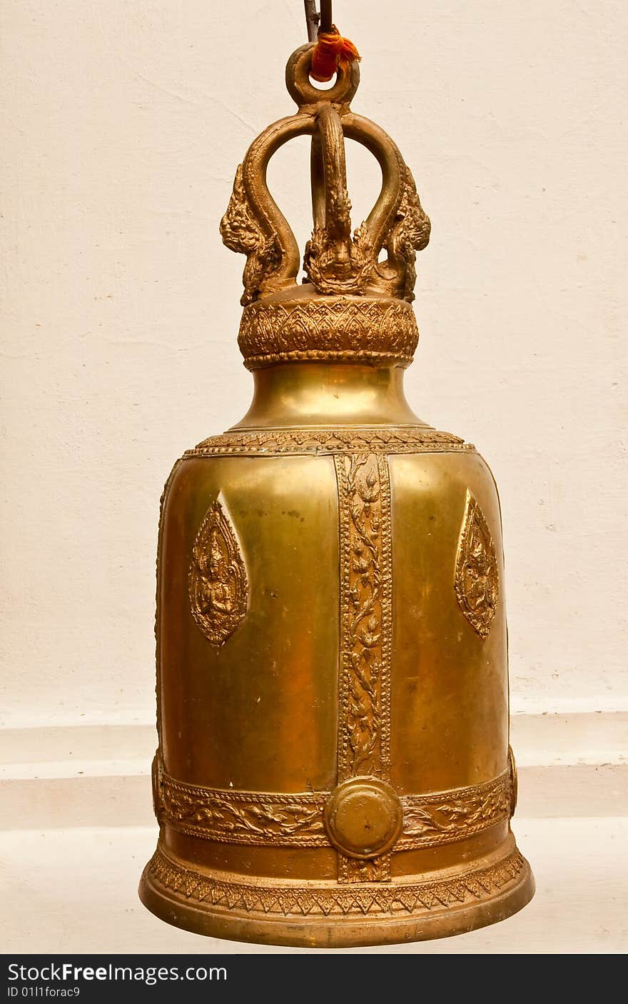 Brass bell in traditional Thai style. Brass bell in traditional Thai style.