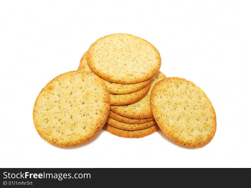 Salted yellow crackers isolated on the white background. Salted yellow crackers isolated on the white background.